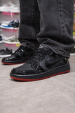 کتونی بسکتبال مردانه نایک ایر جردن 1 مشکی زیره قرمز (Air Jordan 1 Low)